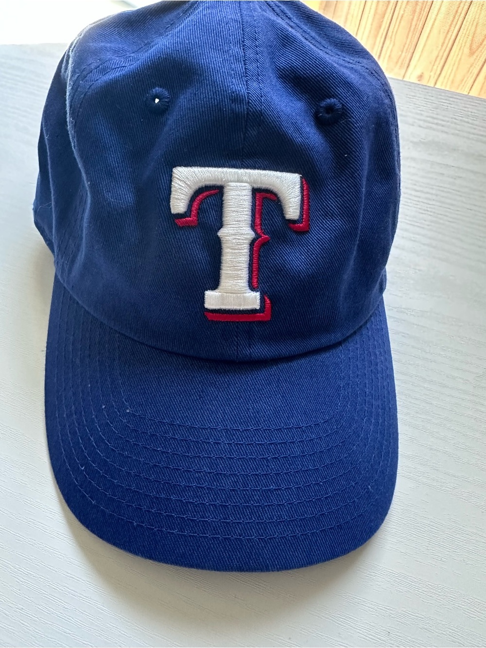 Genuine Merchandise Navy Hat with White and Red 'T' Patch